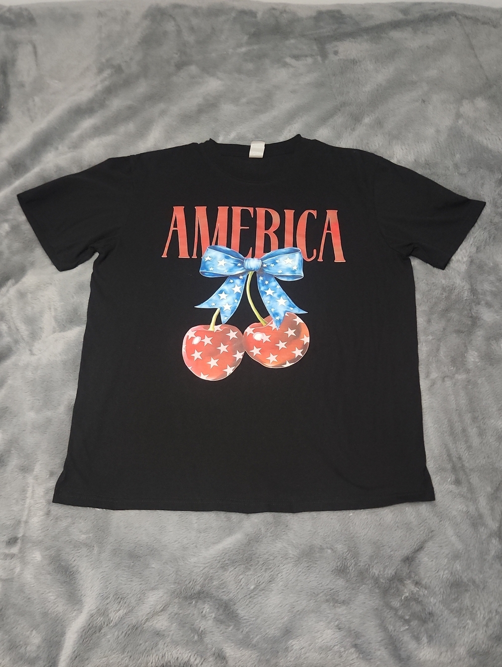 Black Graphic Tee with Patriotic Cherry Design